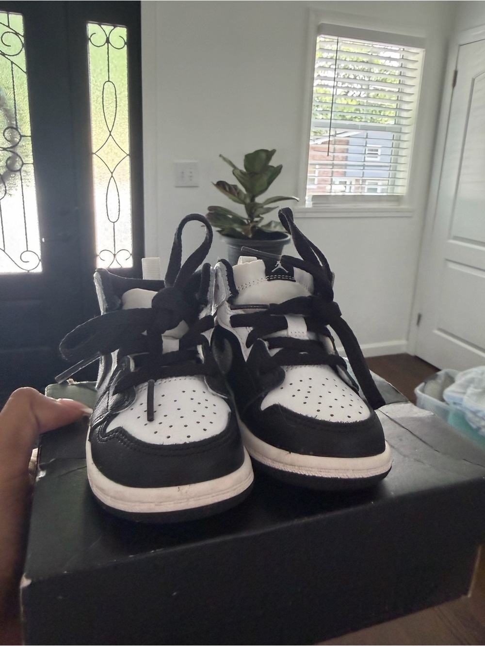 Jordan Kids Black and White High-Top Sneakers